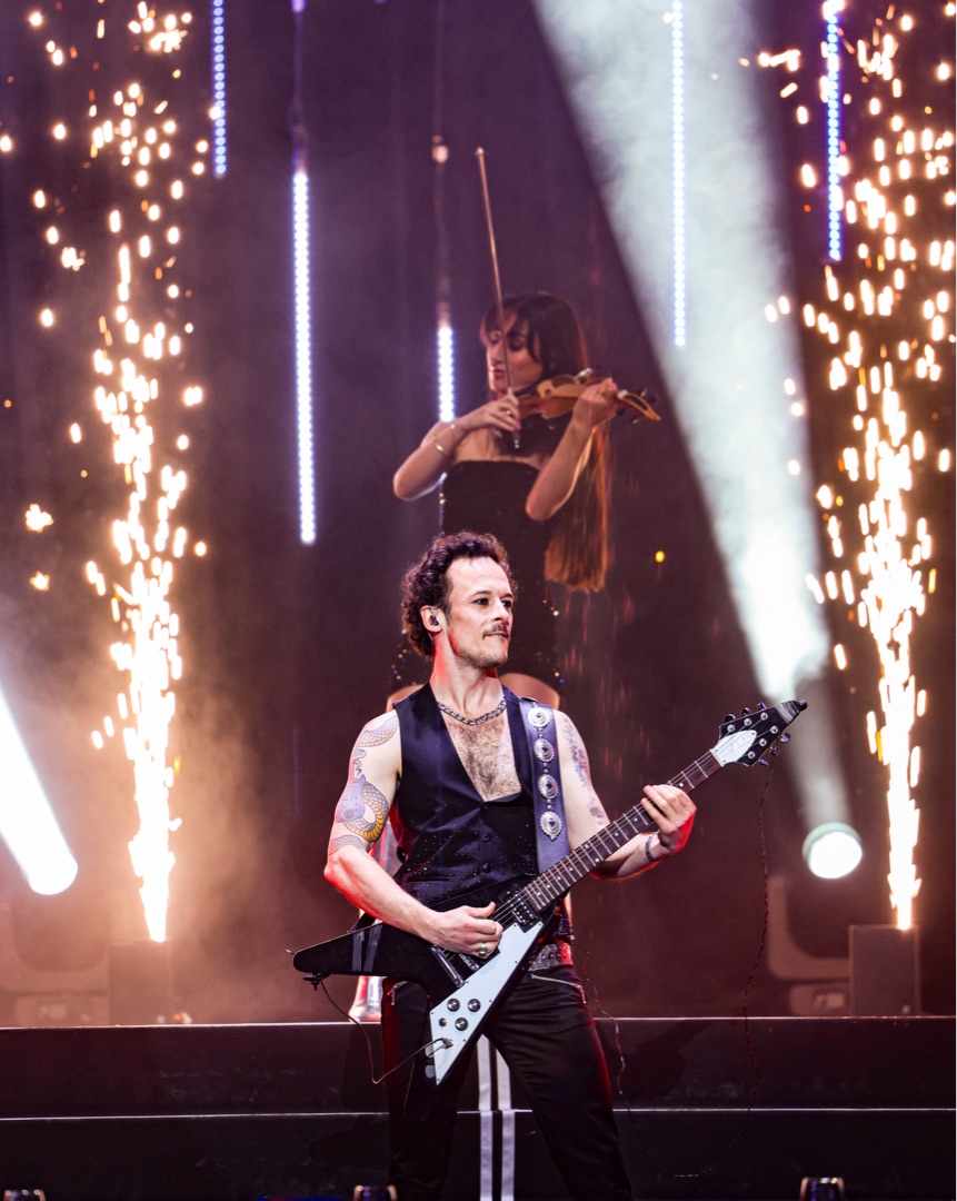 Strings of Fire — fire shooting from guitar at the solo